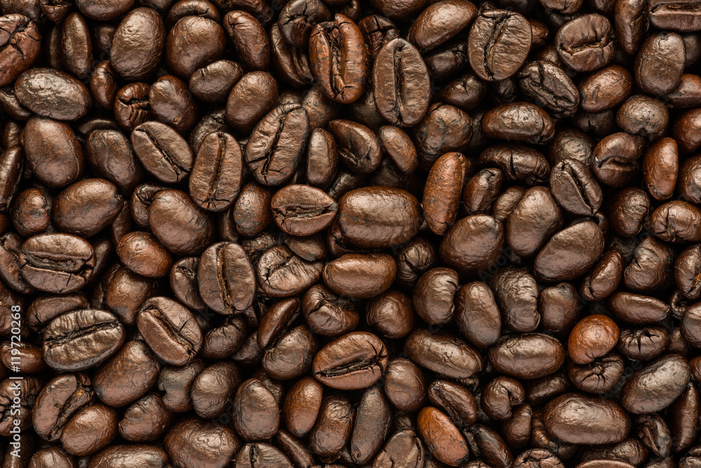 Naklejka premium background of brown coffee beans