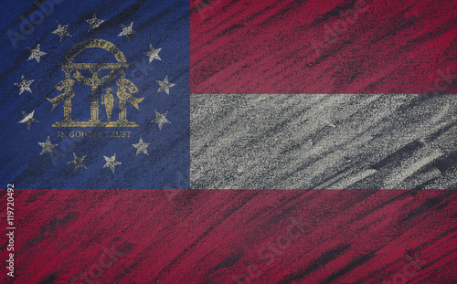 Georgia flag painted with colored chalk on a blackboard.