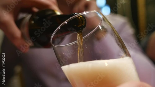 Pouring beer in pub