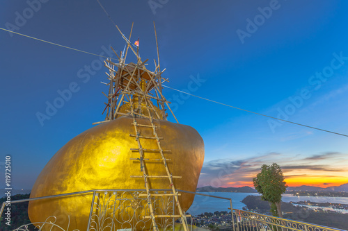 the second Kyaikhtiyo was build on the hill top in Sirey temple near Phuket town Kyaikhtiyo means stone look like head of Hindu sage or saint. photo