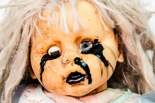 Fotografie Close up of scary baby doll of halloween