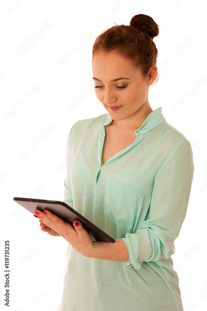 Business woman brousing the web on a tablet isolated over white Business woman brousing the web on a tablet isolated over white