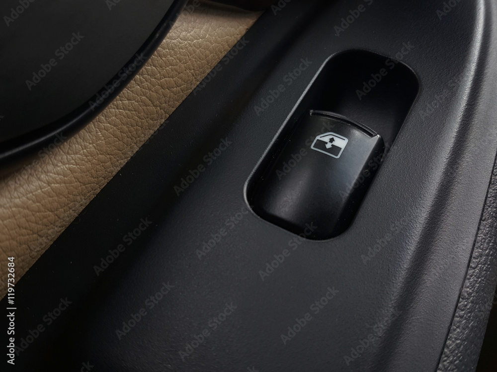 Button to turn off the car window. Button to turn off the car window.