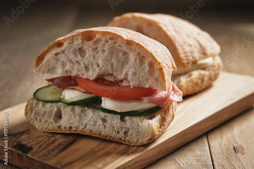 italian sandwich with speck and mozzarella