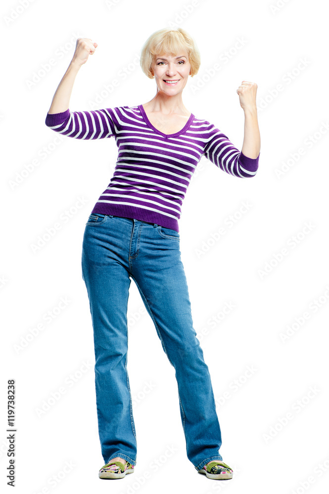 Happy winner. Happy elderly woman keeping arms raised and looking at camera while standing isolated on white background Happy winner. Happy elderly woman keeping arms raised and looking at camera while standing isolated on white background