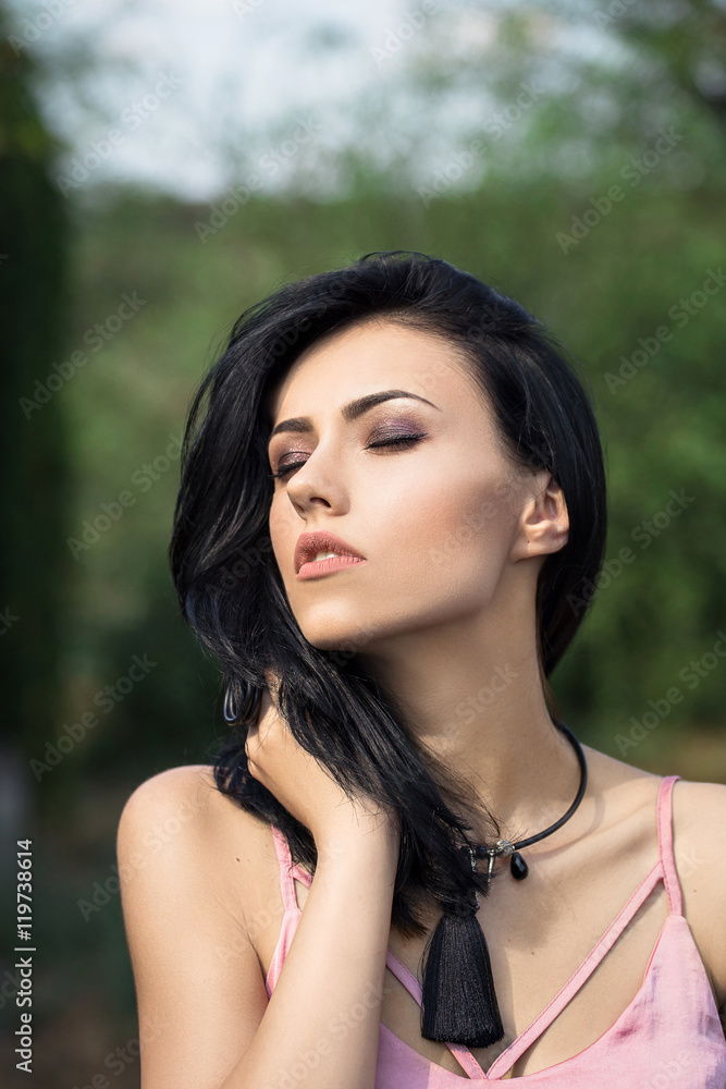 Beautiful girl stands near the wall Beautiful girl stands near the wall