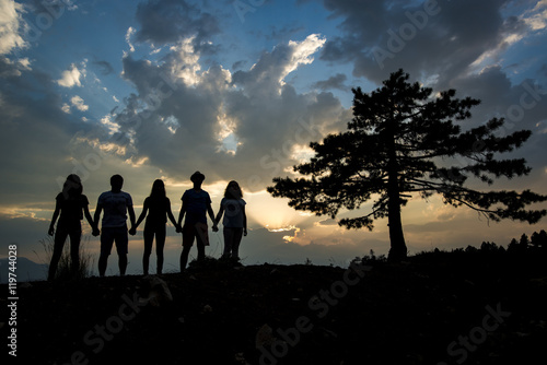silhouette of young people at outdoor