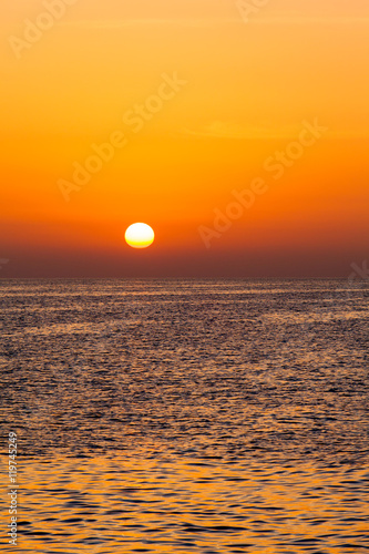 beautiful sunset above the sea.  Colorful sunset over water surf