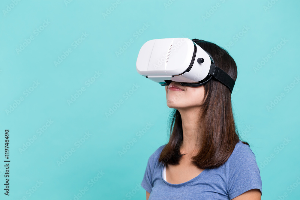 Woman experience though virtual reality device Woman experience though virtual reality device