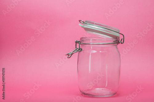 Glass Container On Pink Pastel Background