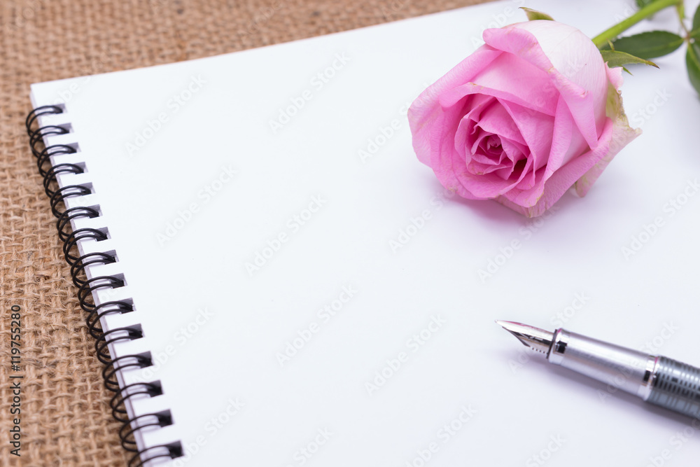 Diary note with rose on gunny bag (Organizer ,agenda, book, diar Diary note with rose on gunny bag (Organizer ,agenda, book, diar