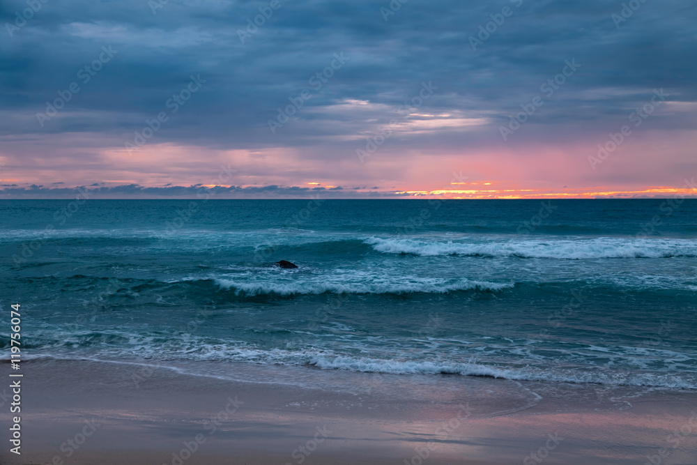 Obraz premium Tropical beach at sunset.
