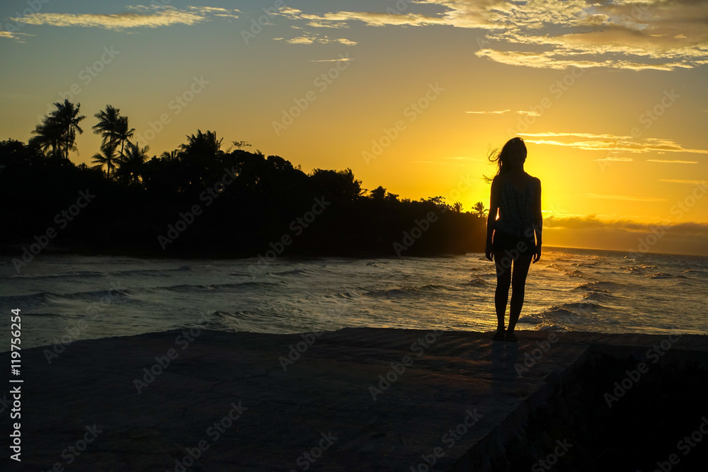 Sexy Woman Silhouette on Orange Sunset Island beach - Alona, Panglao - Philippines