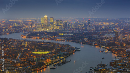 London  England - Panoramic skyline view of east London with the skyscrapers of Canary Wharf at blue hour