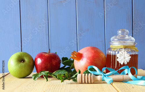 Rosh hashanah (jewish New Year) concept. Traditional symbols photo