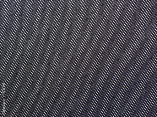 текстура черной ткани в белую полоску, крупным планом 