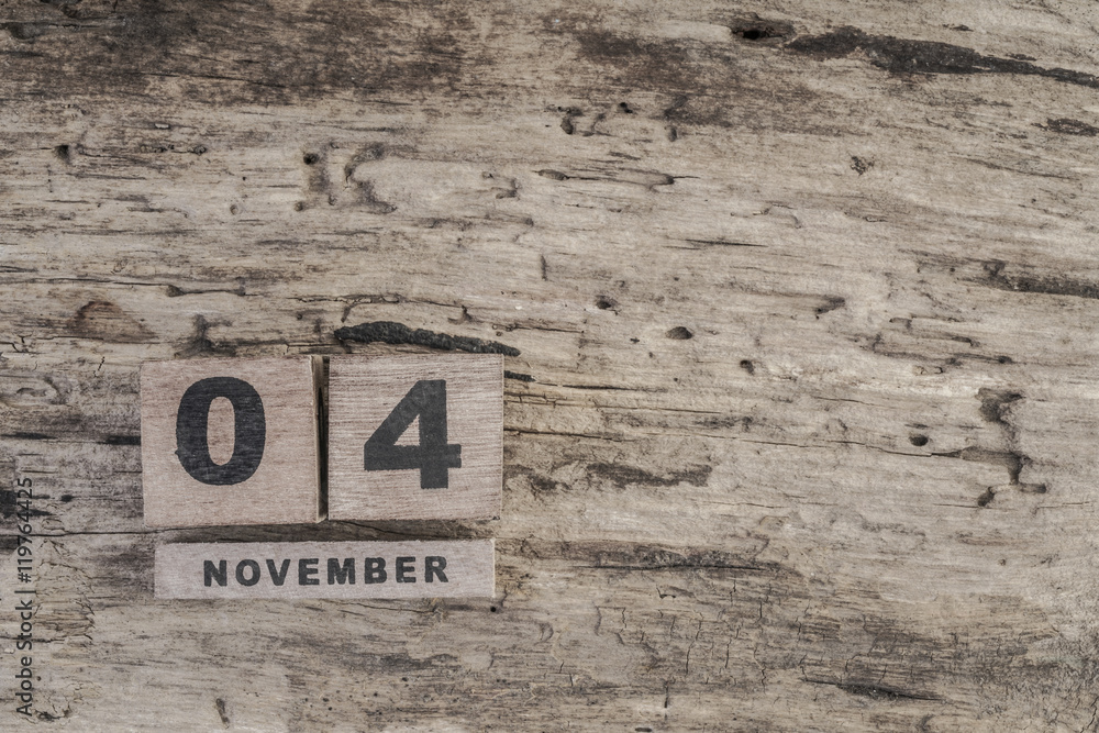 cube calendar for november on wooden surface with copy space cube calendar for november on wooden surface with copy space