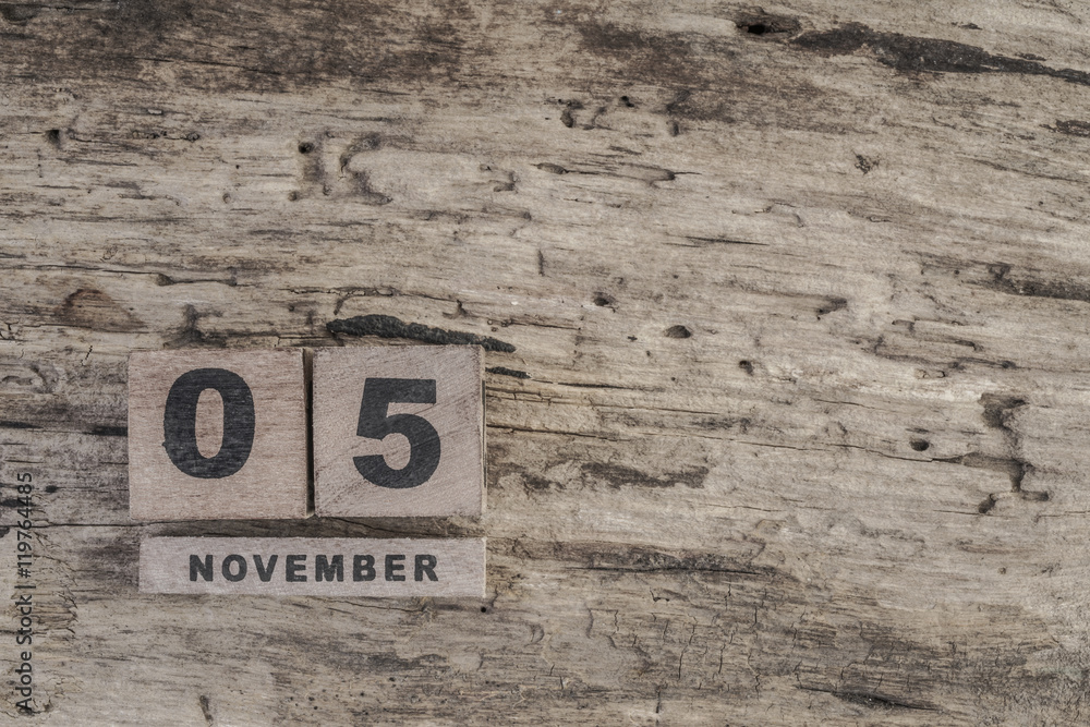 cube calendar for november on wooden surface with copy space cube calendar for november on wooden surface with copy space