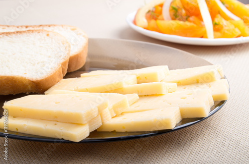 Snacks for home breakfast - slices of cheese and bread
