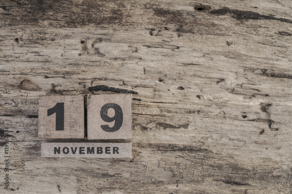 cube calendar for november on wooden surface with copy space cube calendar for november on wooden surface with copy space