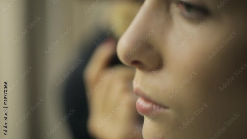 Close up view of woman model getting make up. Close up view of woman model getting make up.