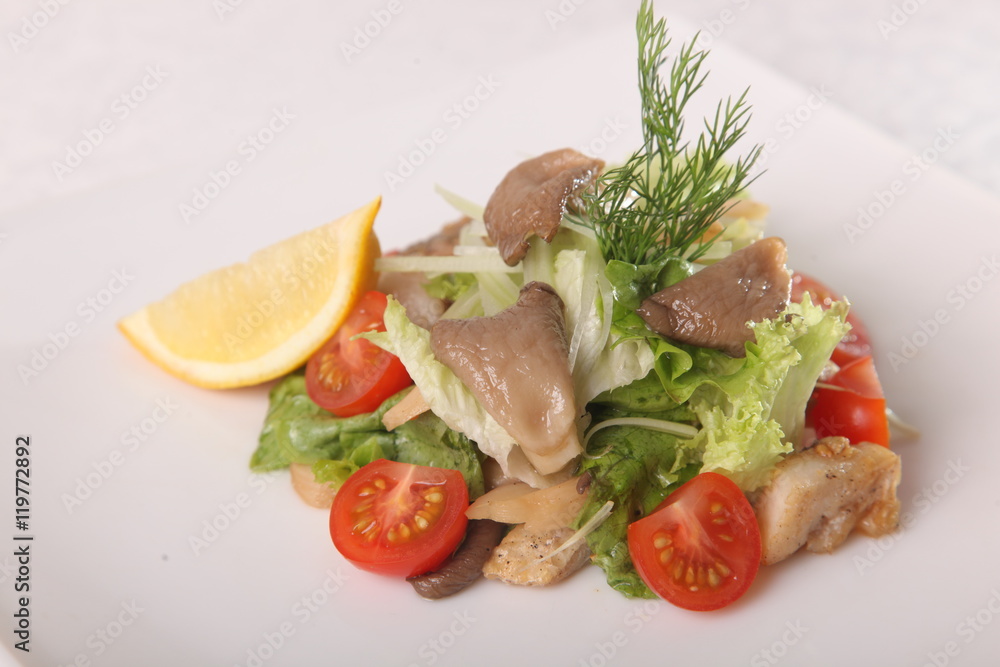 Salad with mushrooms and tomatoes