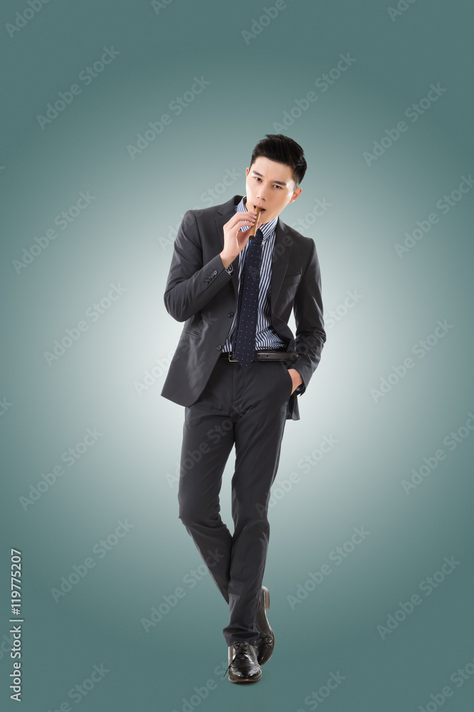 businessman holding a cigar businessman holding a cigar