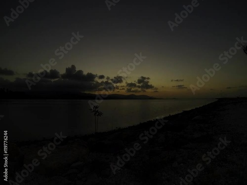 View of evening passed by at coast of sea. Clouds in sky. Nught. Nature. Timelapse. photo