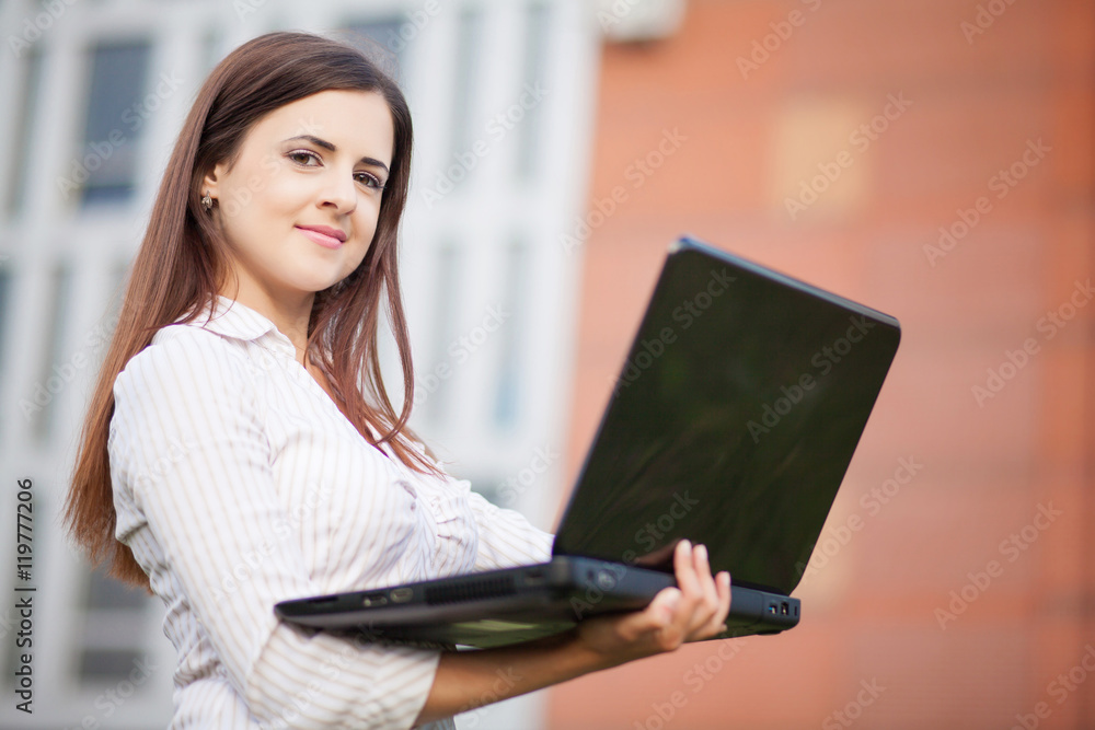 pretty young businesswoman with computer pretty young businesswoman with computer