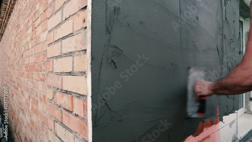Applying Cement Render