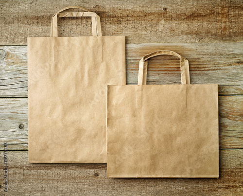 two paper shopping bags