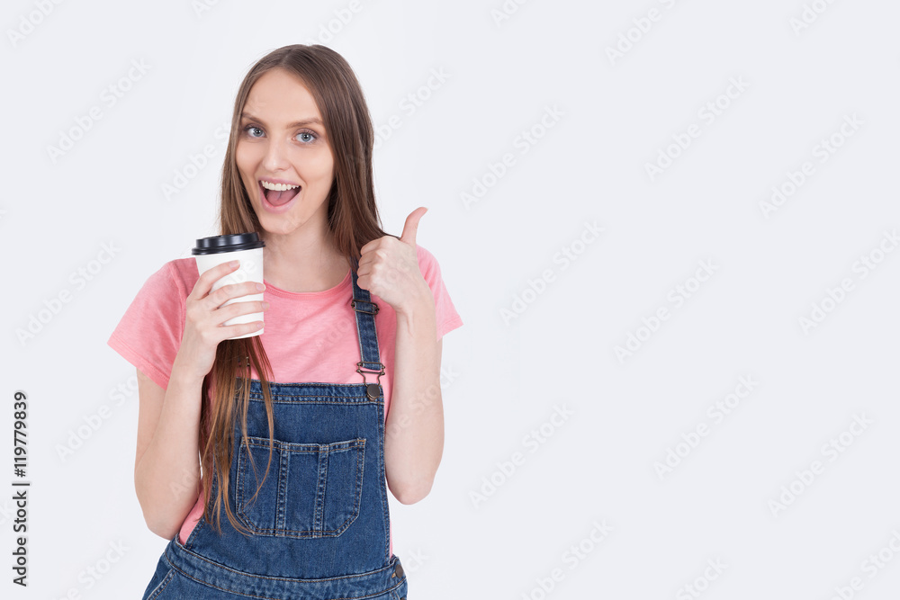 Smiling girl with coffee cup Smiling girl with coffee cup