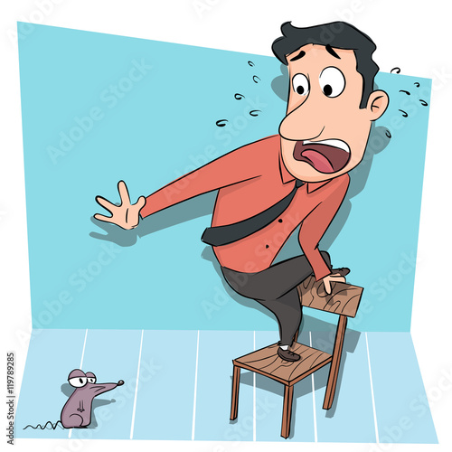 man standing on chair afraid of rat.