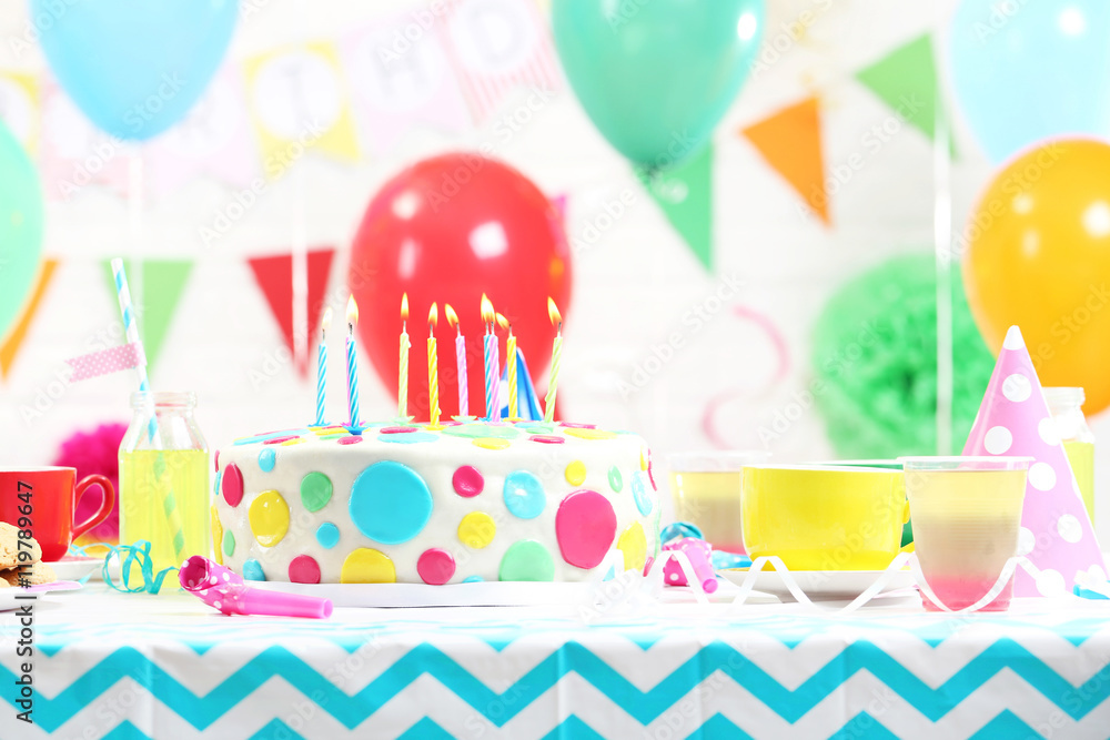 Birthday cake with candles on wooden table Birthday cake with candles on wooden table