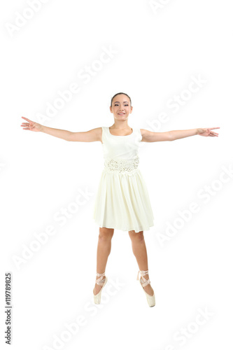 Young gymnasts in  pointe shoes on a white background