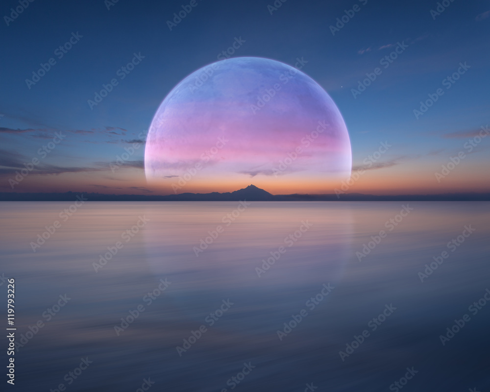 Naklejka premium Pink planet like moon above the ocean and mountain