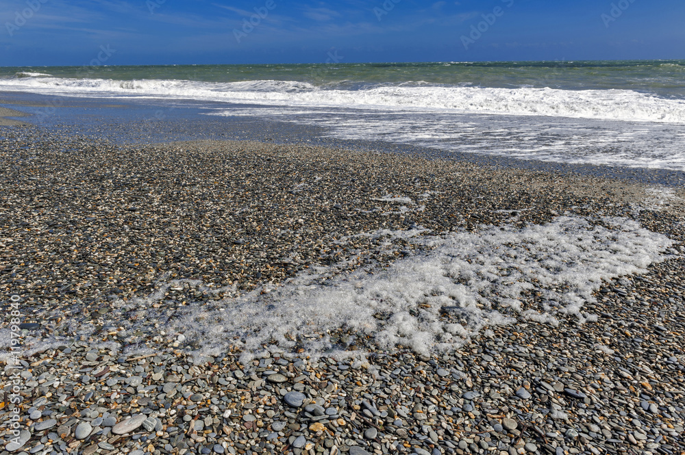 Pebble beach of Tauparikaka Marine Reserve, Haast, New Zealand Pebble beach of Tauparikaka Marine Reserve, Haast, New Zealand