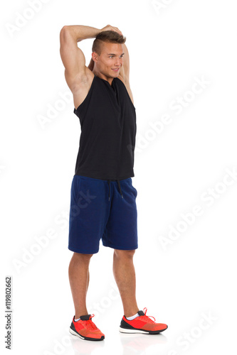 Man Stretching Triceps