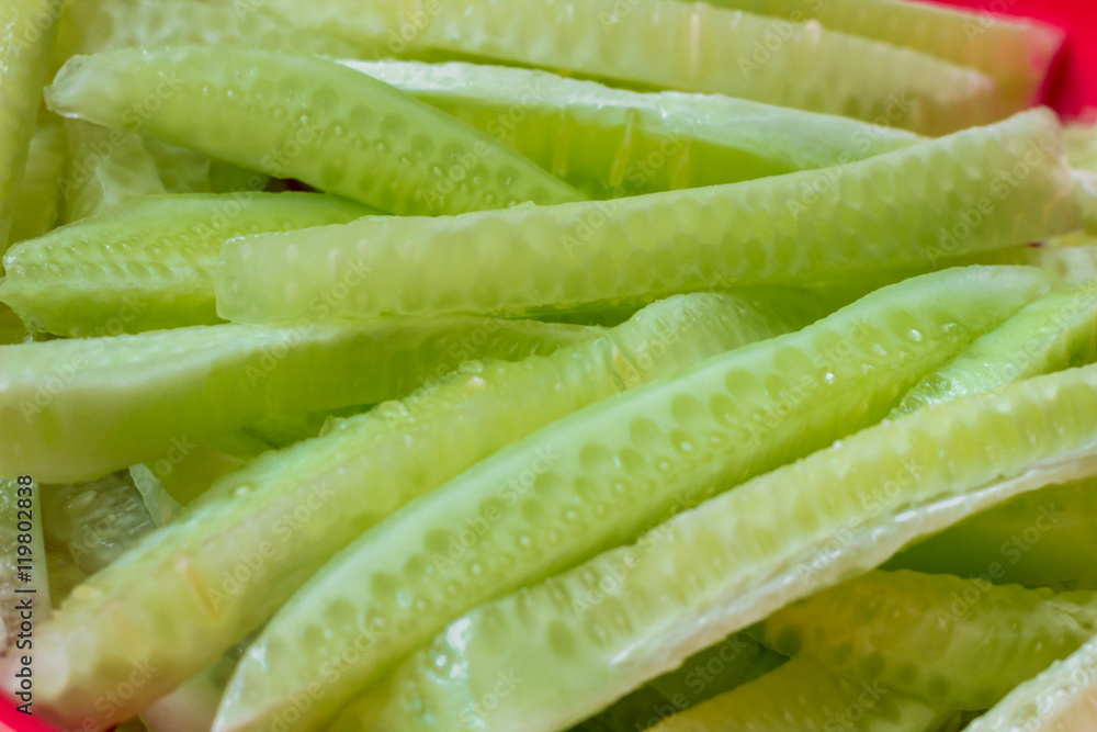 Fresh strips of fresh juicy cucumber sliced for sushi Fresh strips of fresh juicy cucumber sliced for sushi