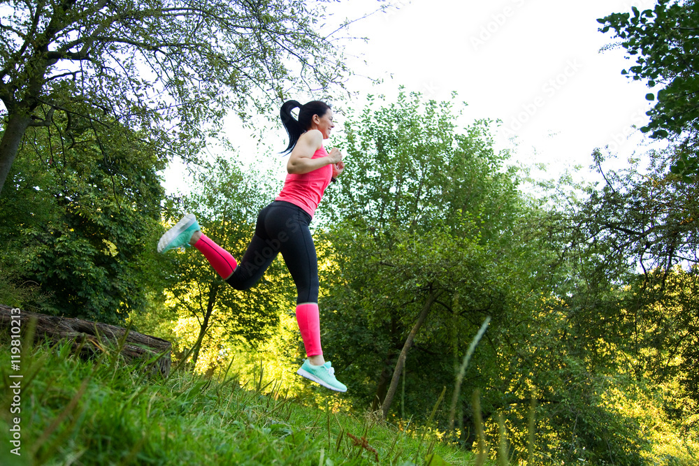 young woman running in nature young woman running in nature