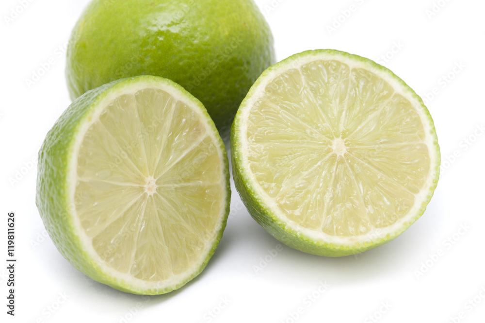 Halved and whole fresh limes