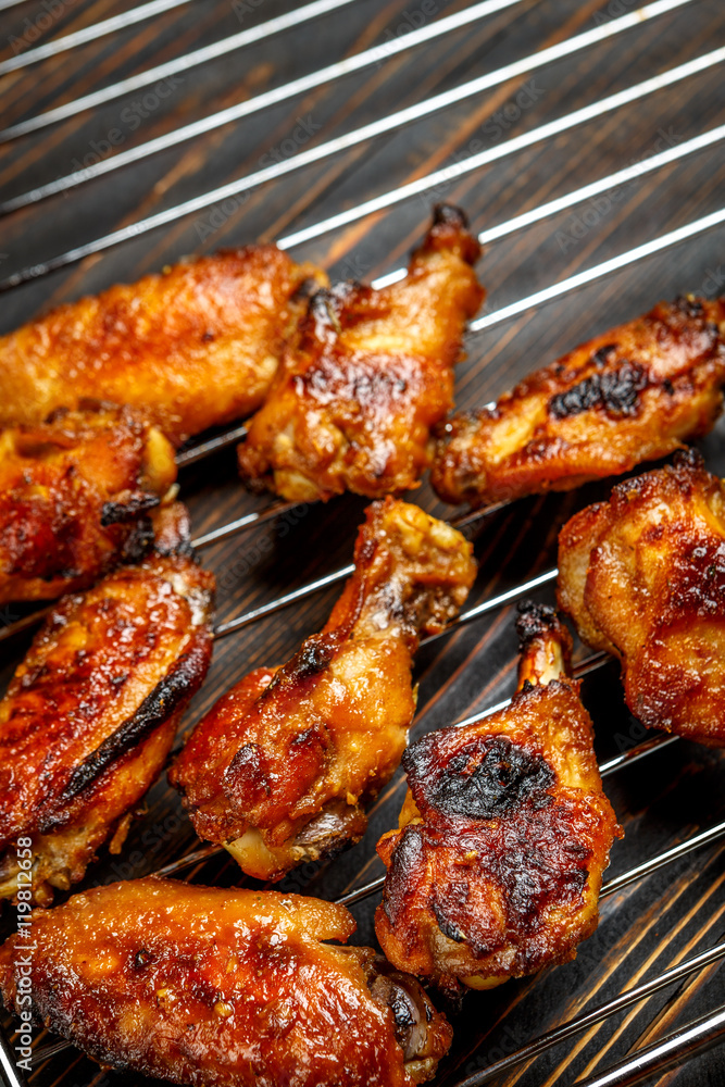 Grilled chicken wings on the grill