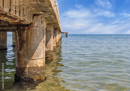 Photos Dock concrete pillar on sea background