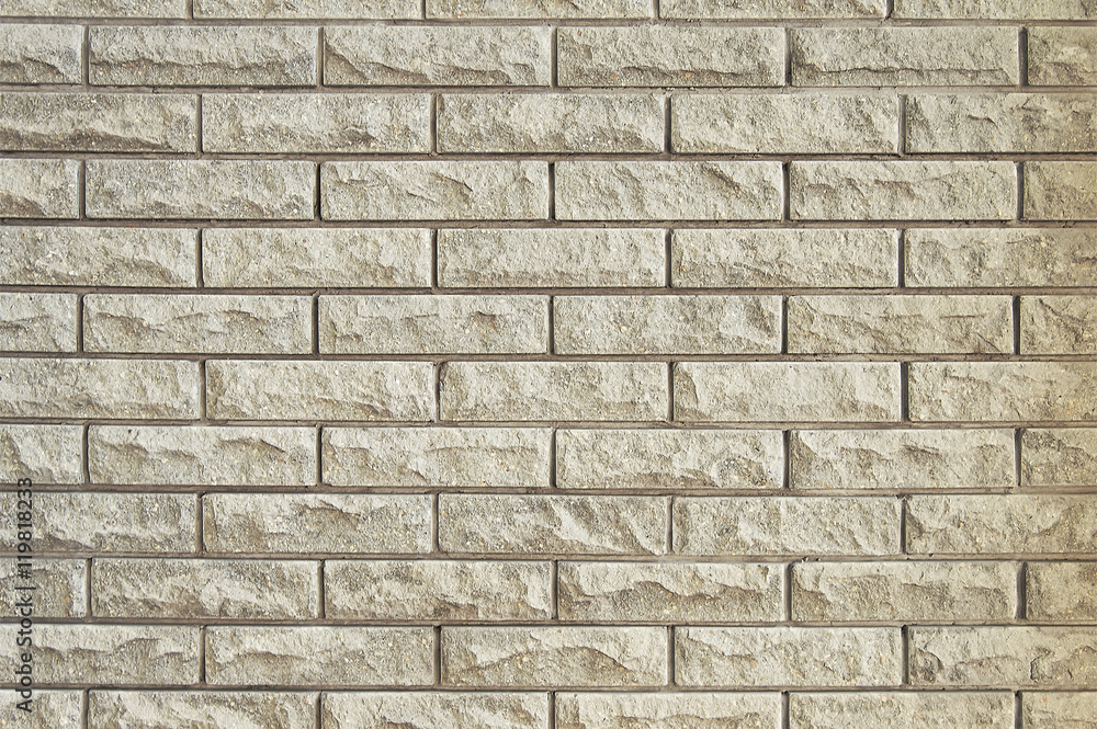 Fototapeta premium Old beige brick wall background texture