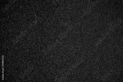 Black textured background - Sandpaper texture for Backdrop. Abst photo