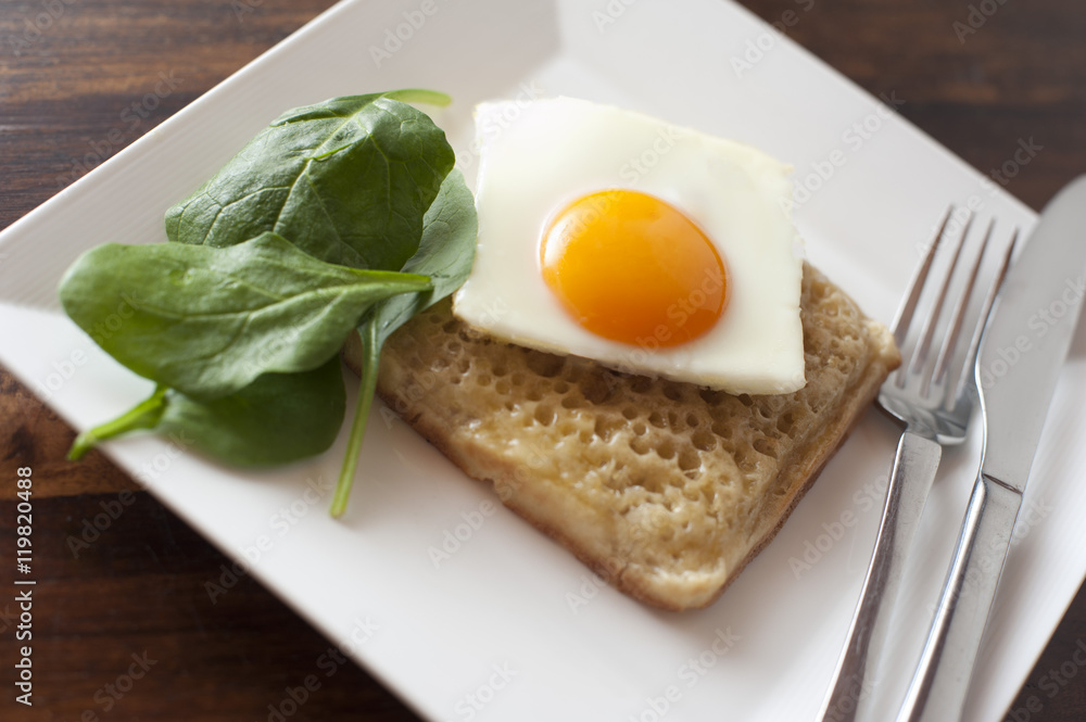 square egg sunny side up on a crumpet square egg sunny side up on a crumpet
