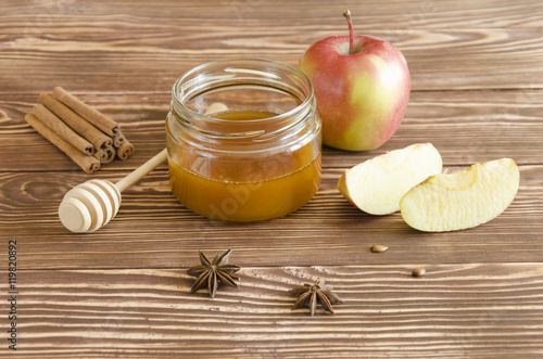 Honey jar, apples and spice
