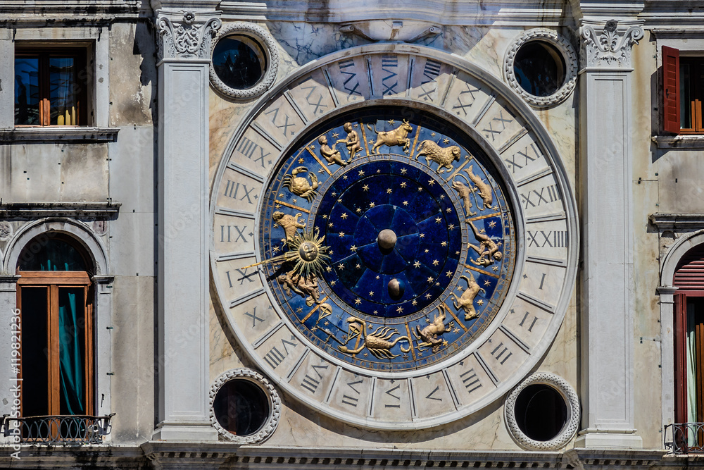 Zodiac clock Tower with winged lion and two moors (1497). Venice