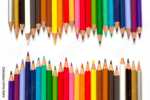 Row of color pencil on white background