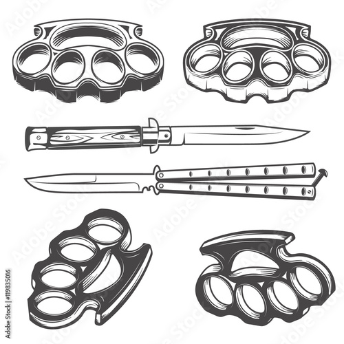Set of the knives and brass knuckles.